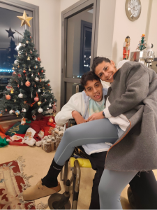 Mother hugging her son dearly