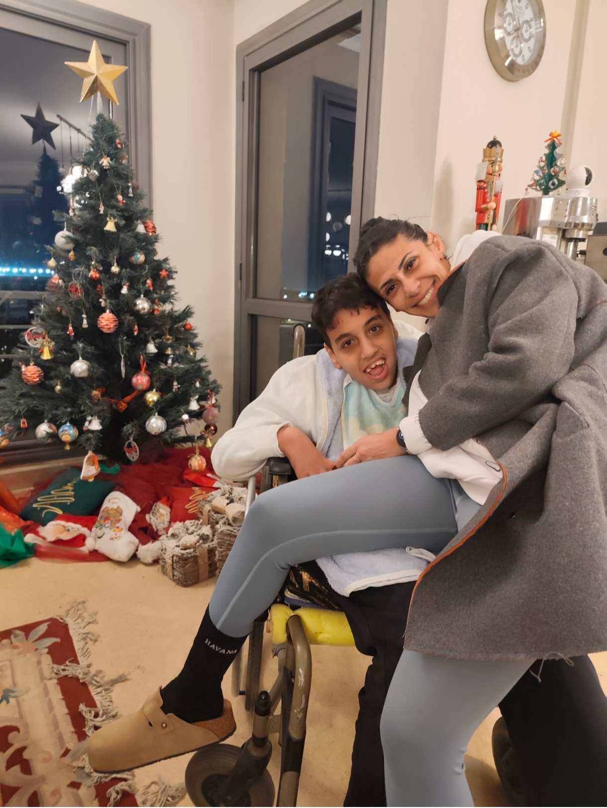 Mother hugging her son dearly